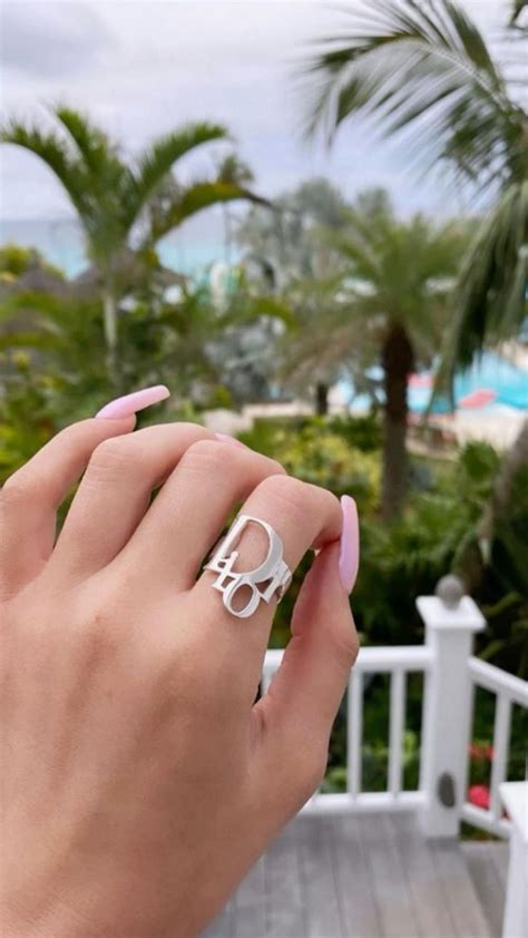 dior silver cut out logo ring